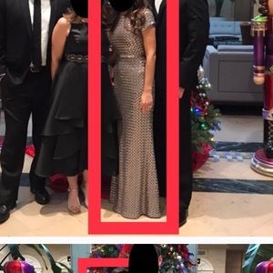 Betsy and Adam silver sequin gown.